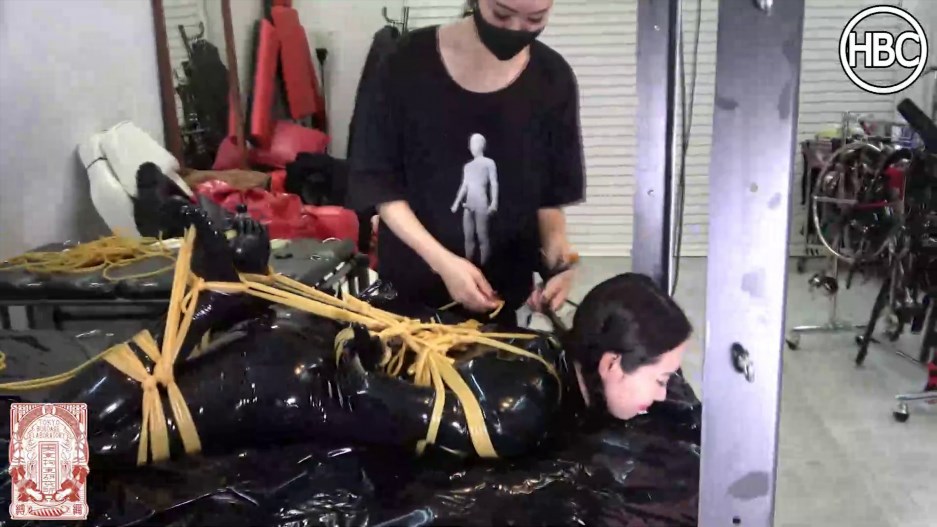 Hinako in latex catsuit gets strictly hogtied with latex tubes
